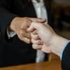 Partner Business Trust Teamwork Partnership for success.Business man fist bump hand together