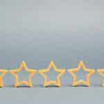 Five stars on a gray background