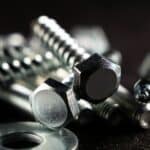 Close-up photo of a set of fasteners on a black surface
