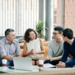 Business people listening to colleague