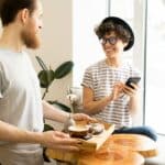 Lady customer smiling at waiter