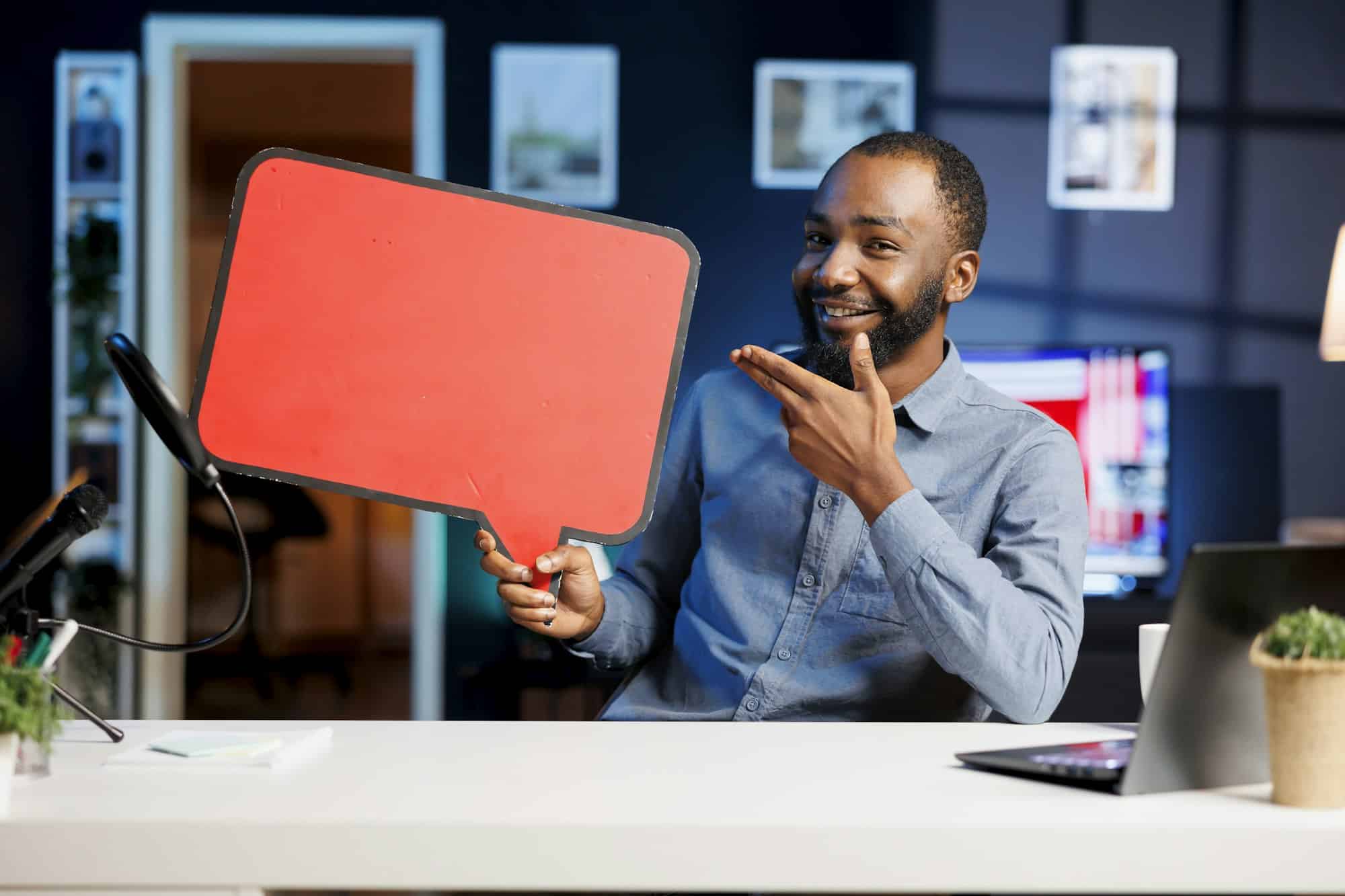 Man holds sponsorship copy space sign