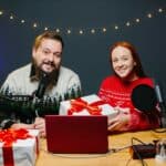 Christmas stream or video blog. Cheerful presenters raffle off gifts for their subscribers.