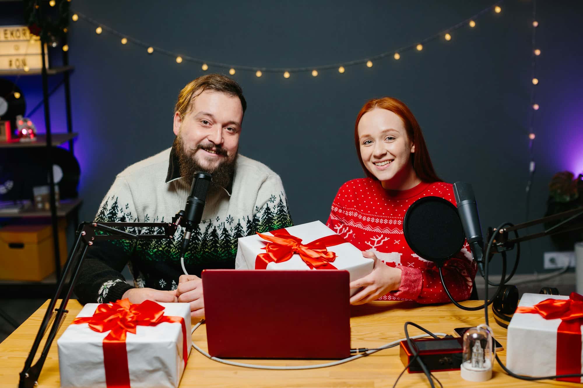 Christmas stream or video blog. Cheerful presenters raffle off gifts for their subscribers.